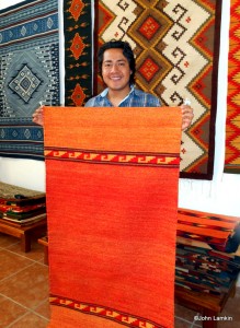 Diego Montaño and one of his rugs