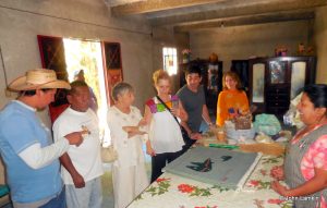 Our family looks on as art director, Jacinto Morales, discusses technical aspect with Juan Luis and his wife Paula